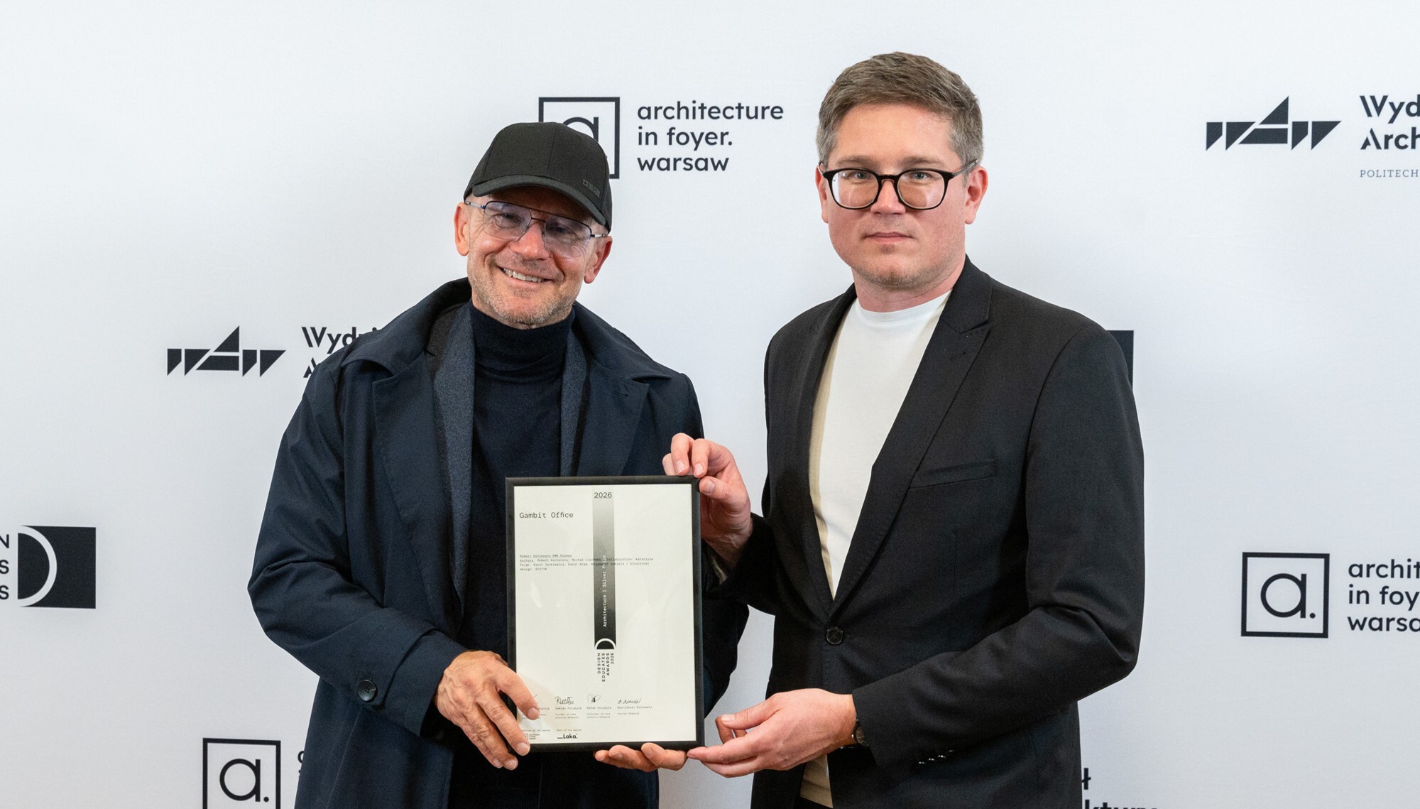 Gambit Office — the certificate is handed over